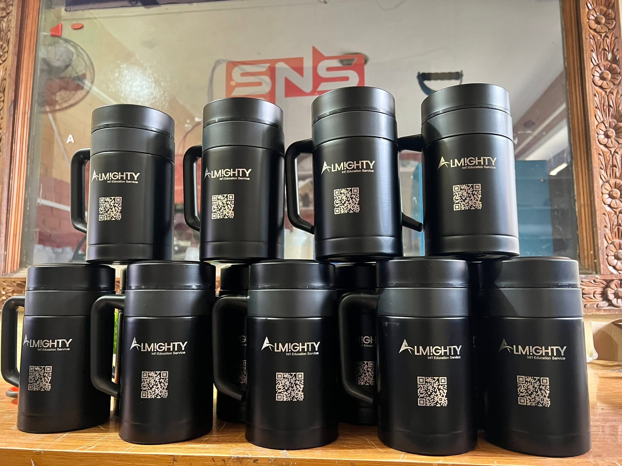 Engraved thermos flasks and mugs ready for dispatch
